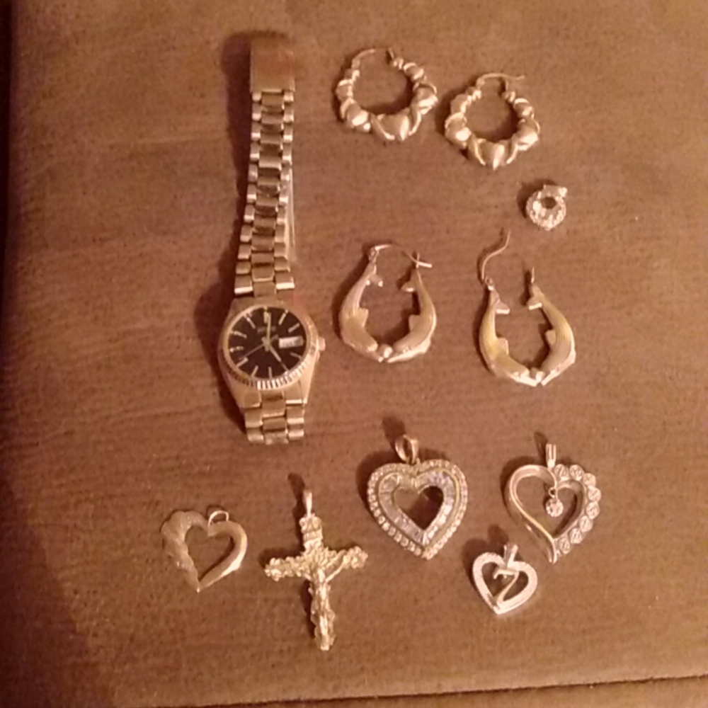 Jewelry;Seiko gold watch,two pair of gold earrings and 6 charms for any necklace